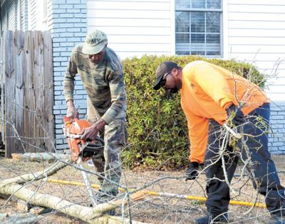jones tree service service llc jones tree service workers stephen mcmichael left and angel sackel remove storm damaged trees from an ellis avenue home friday afternoon ice damages price tag may exceed 2004 for some business jones tree service service llc jones tree service workers stephen mcmichael left and angel sackel remove storm damaged trees from an ellis avenue home friday afternoon ice damages price tag may exceed 2004 for some business