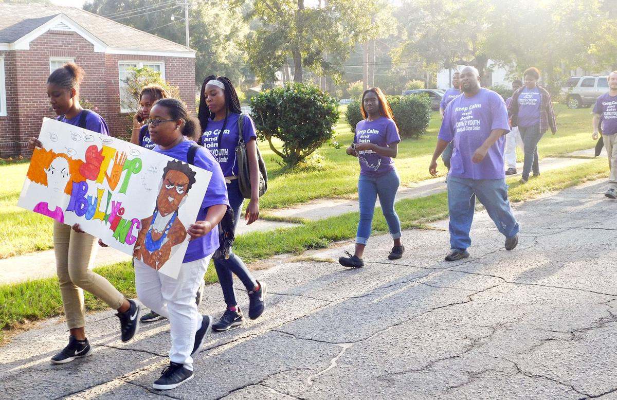 Peace walk More than 150 from Job Corps Center march to end youth
