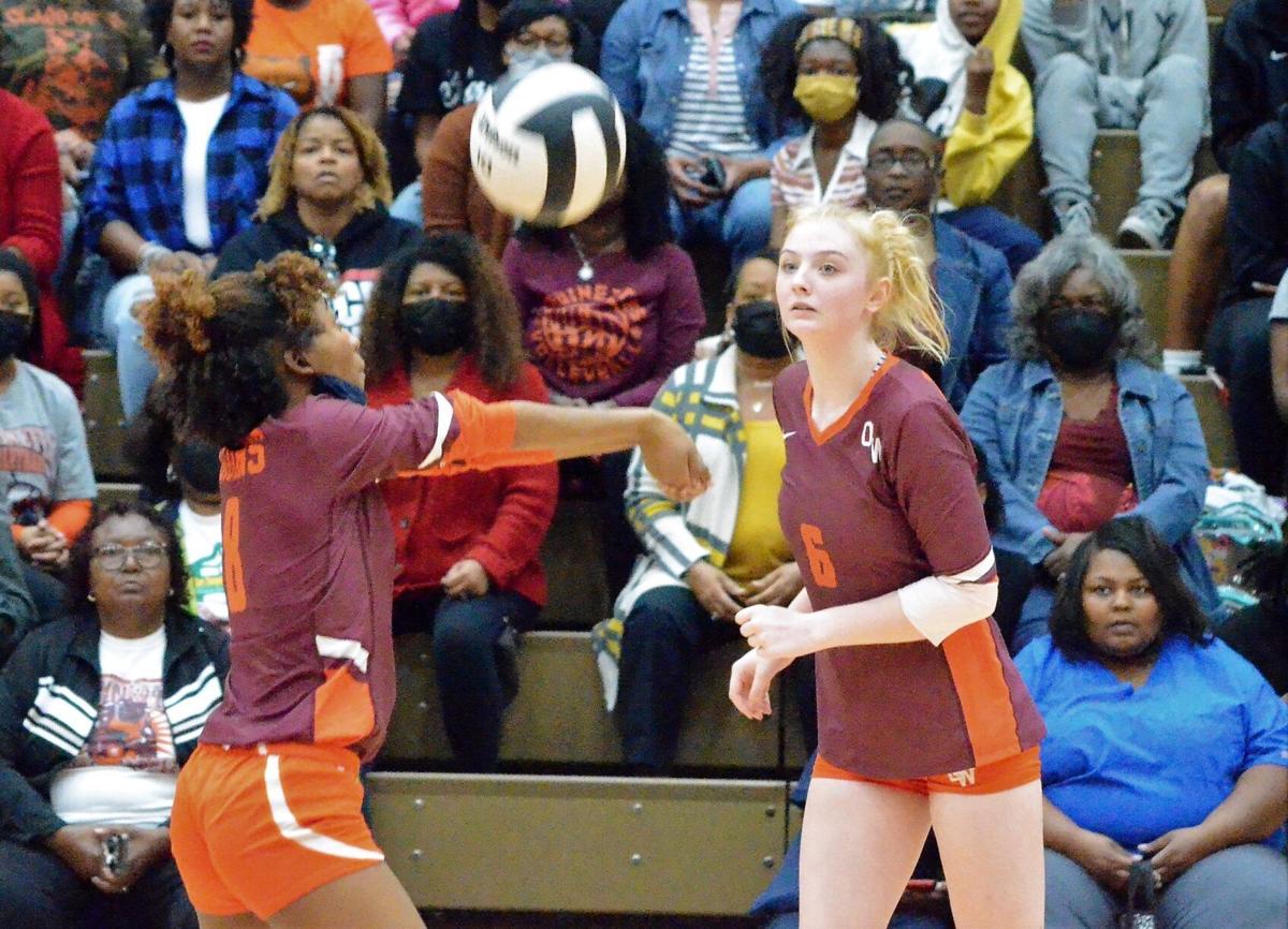 HIGH SCHOOL VOLLEYBALL hand Gilbert first region loss