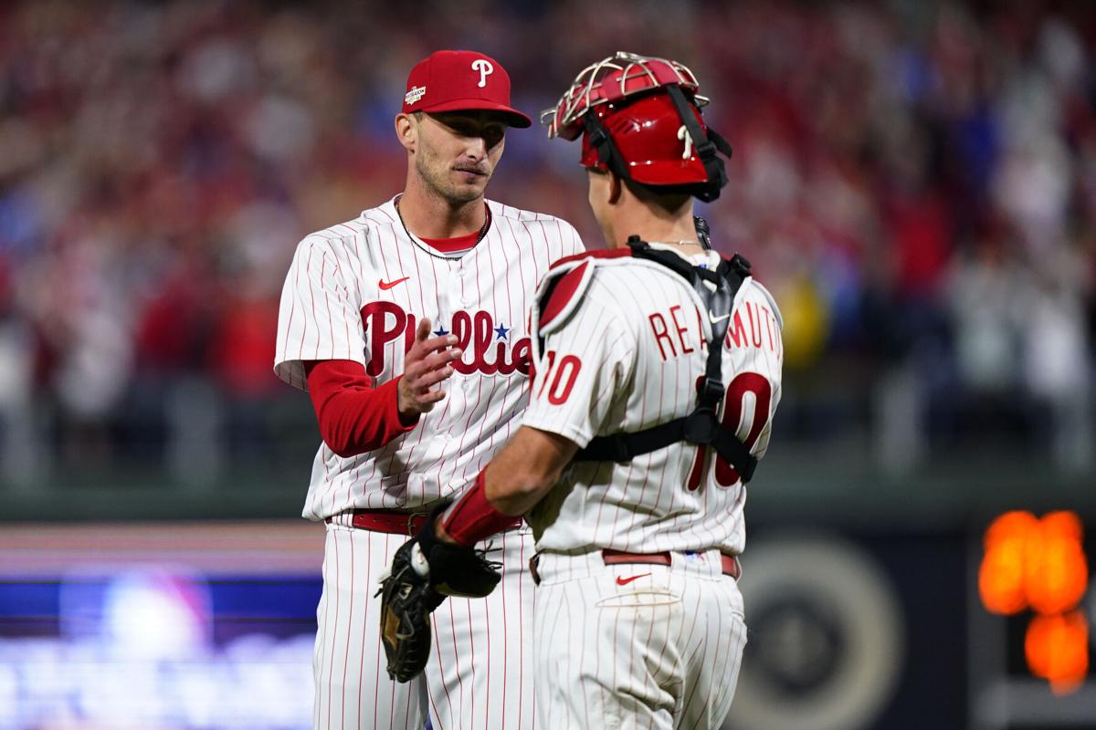 Spike This! Hoskins, Harper homer, Phils rout Braves in NLDS