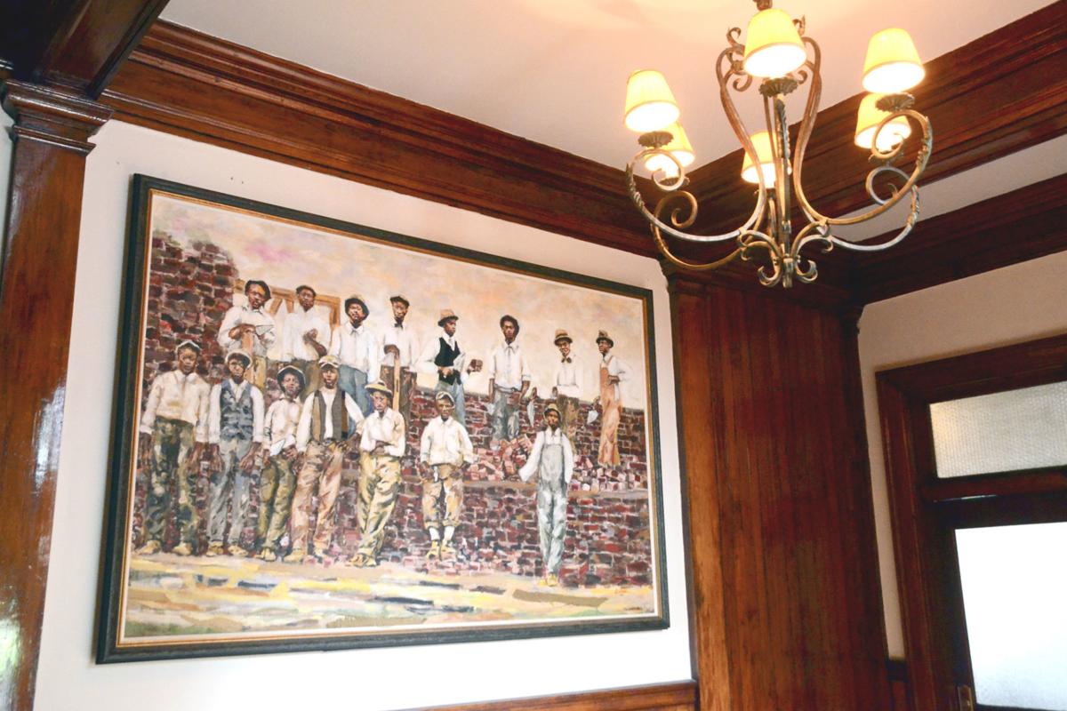 Robinsons donate painting to Claflin; Pulitzer winner's wife is artist