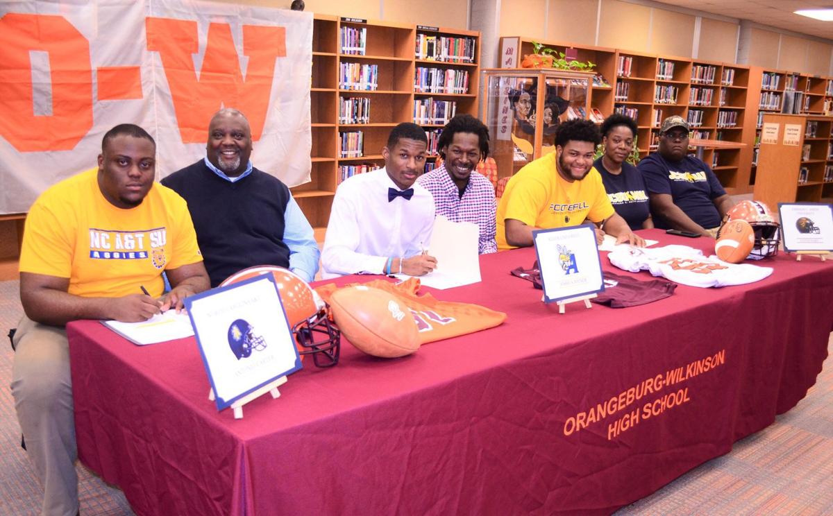 Bruins sign scholarships