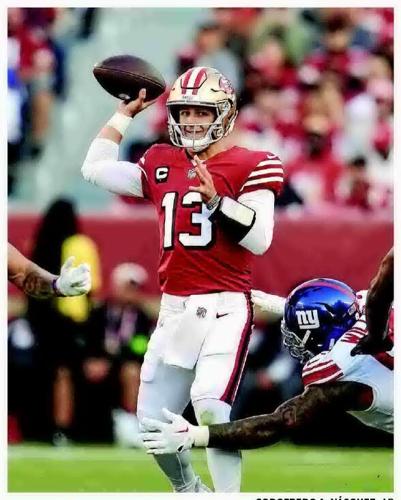 Christian McCaffrey and the 49ers win 13th straight in the regular season,  beat the Giants 30-12