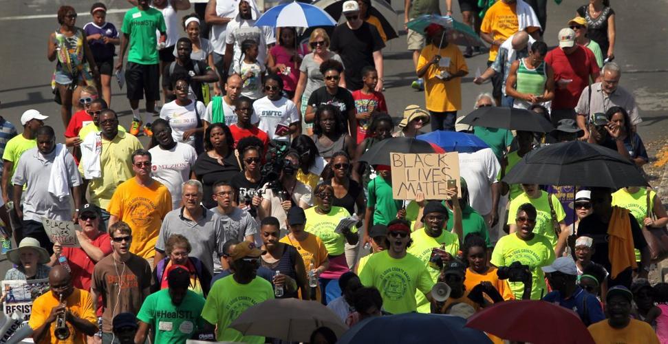 March marks two weeks since death of Michael Brown