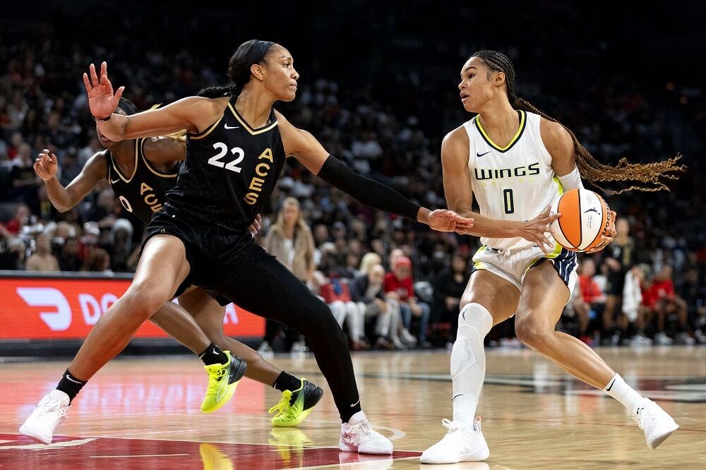 Defending champion Aces return to WNBA Finals, beat Wings 64-61 to