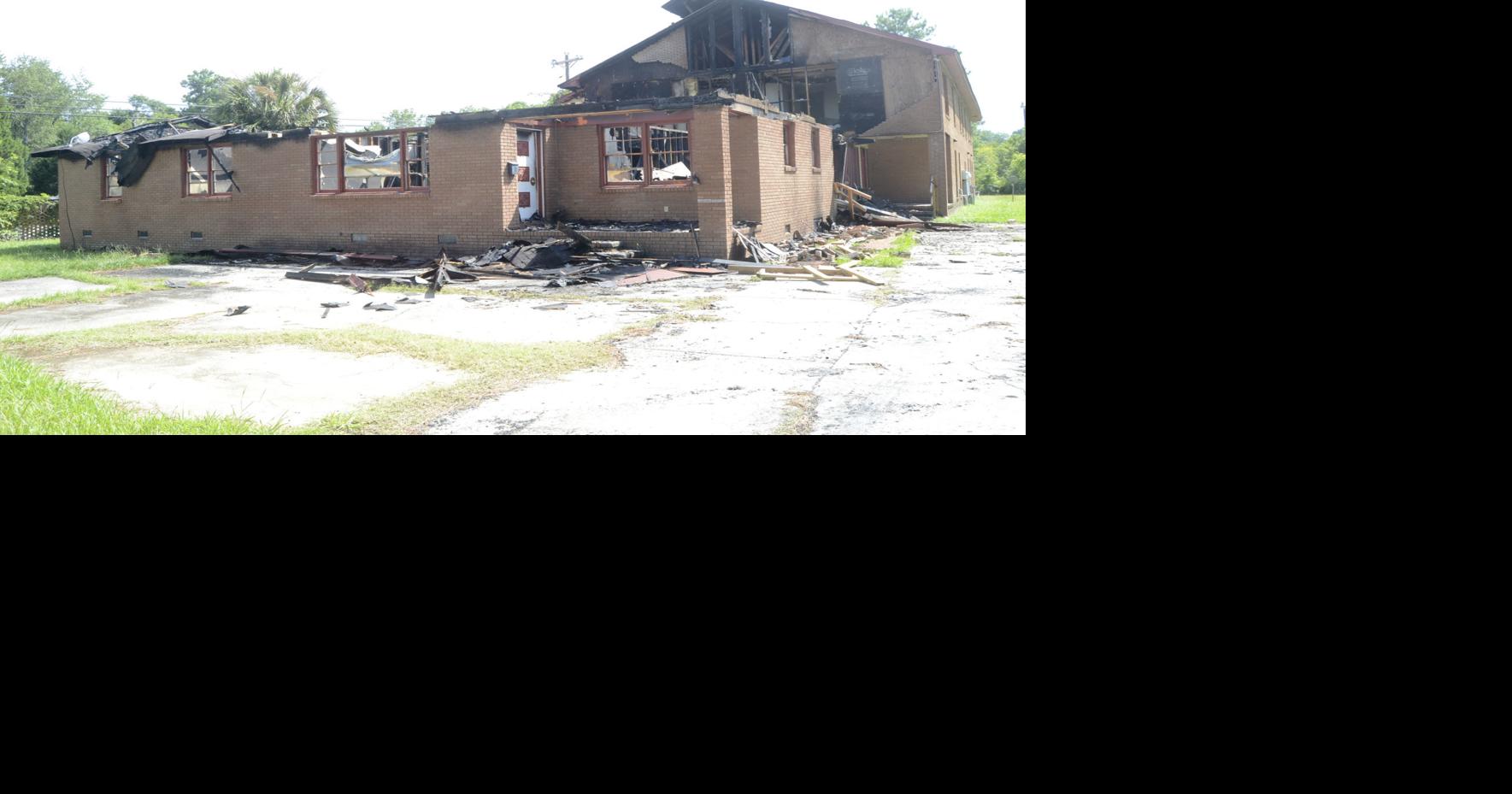 Vacant apartment building catches fire