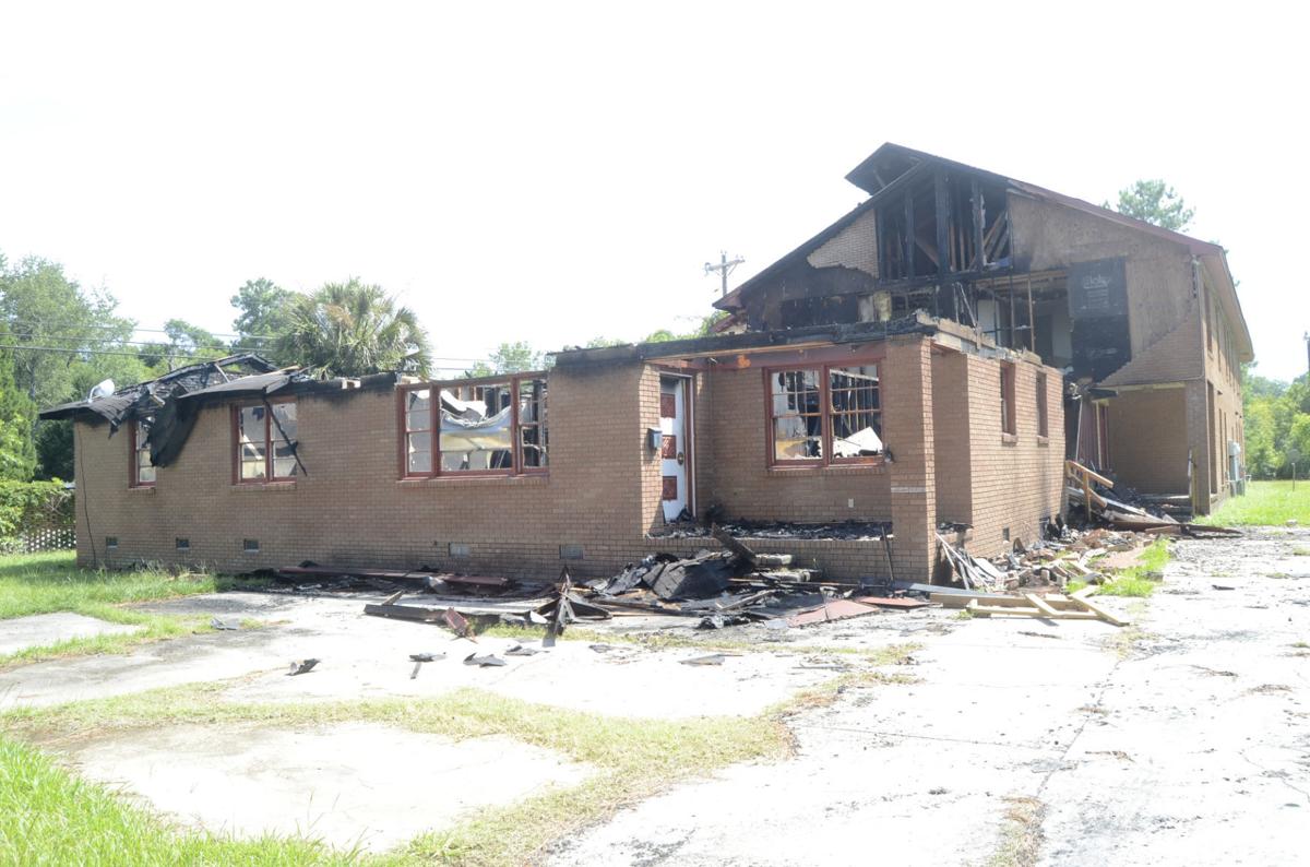 Vacant apartment building catches fire