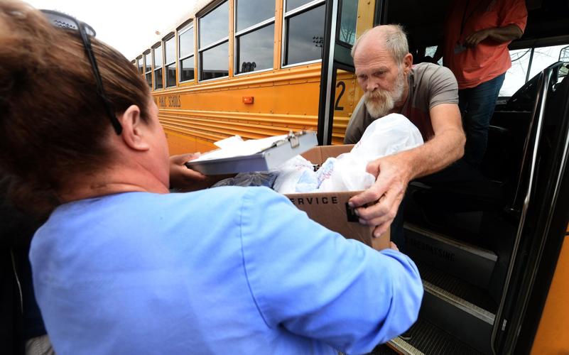 PHOTOS: ABSS grab and go lunches prepared for delivery to students ...