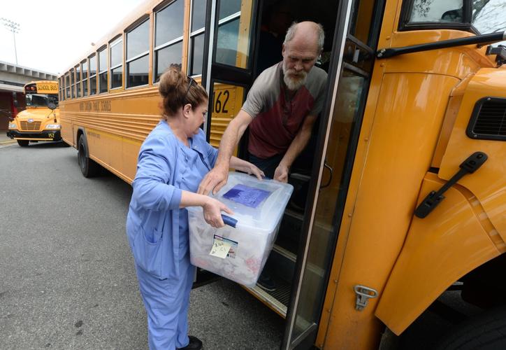 PHOTOS: ABSS grab and go lunches prepared for delivery to students ...