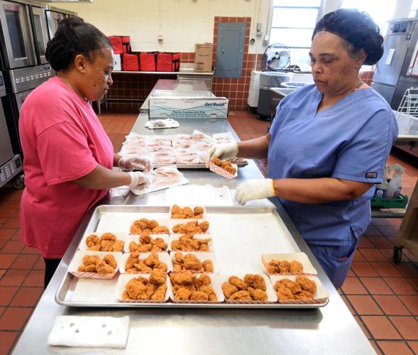 PHOTOS: ABSS grab and go lunches prepared for delivery to students