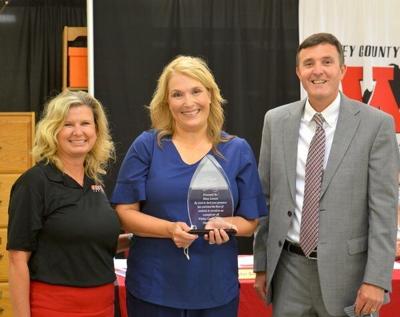 Nurse Lawson honored with Above and Beyond Award by Whitley schools