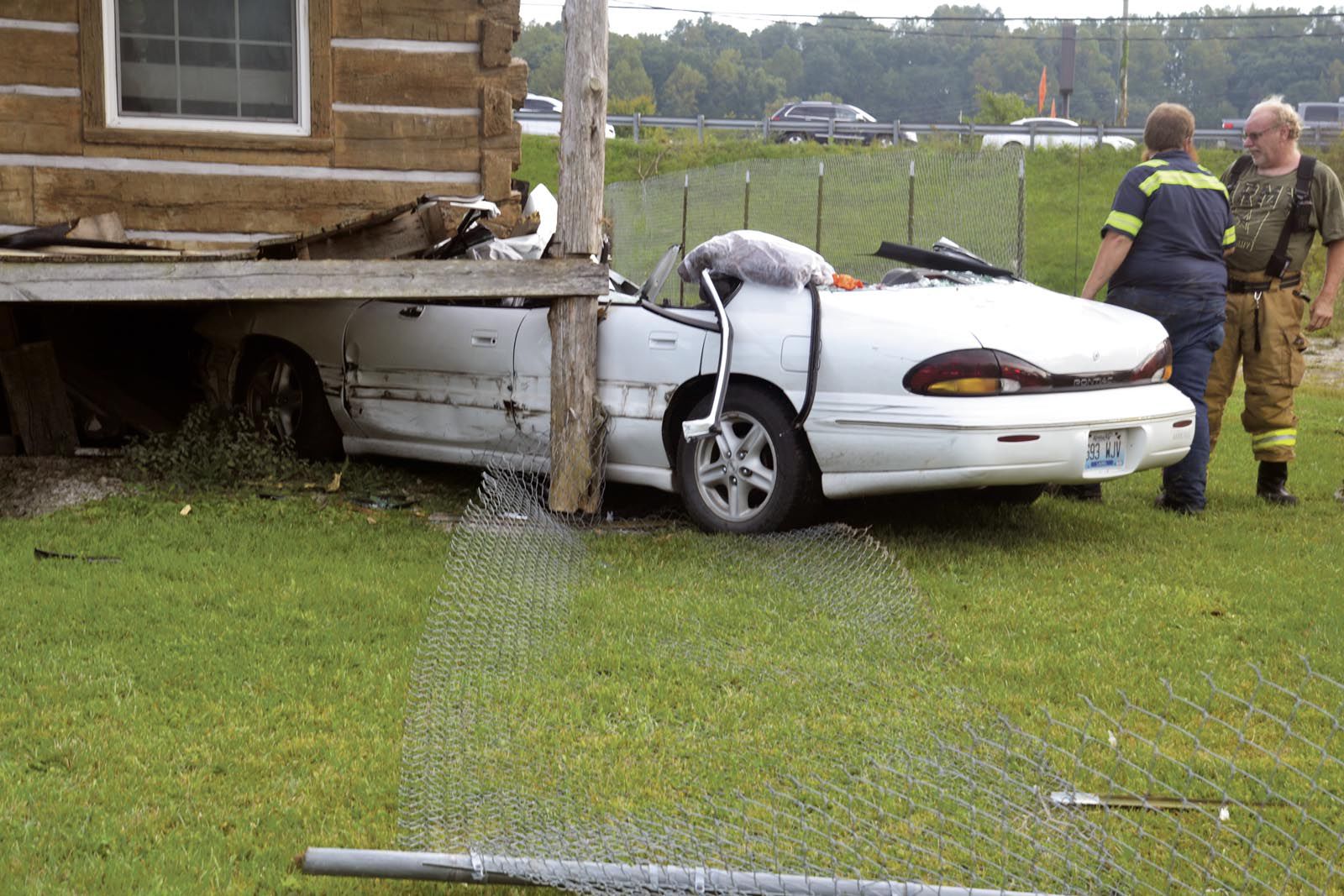 Car hits building after crash with another vehicle News