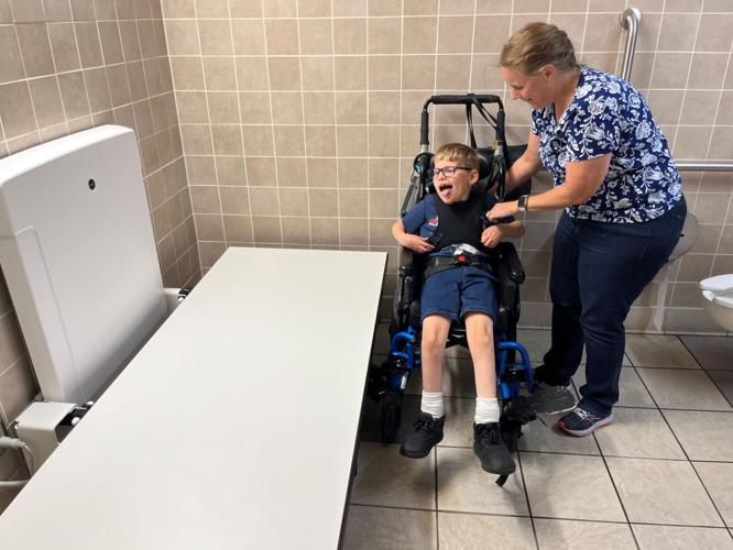 More restrooms have adult-size changing tables to help people with ...