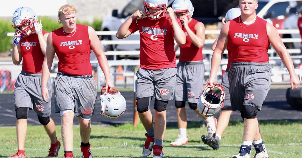 FOOTBALL IS IN THE AIR The Corbin Redhounds held their first practice