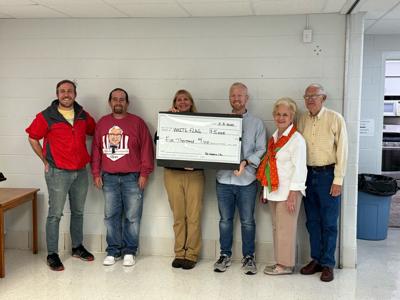 Colonel Fest Race Committee presents White Flag Ministries with check ...