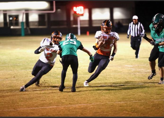 Harlan’s Jonah Sharp runs for 301 yards and a TD to lead Green Dragons