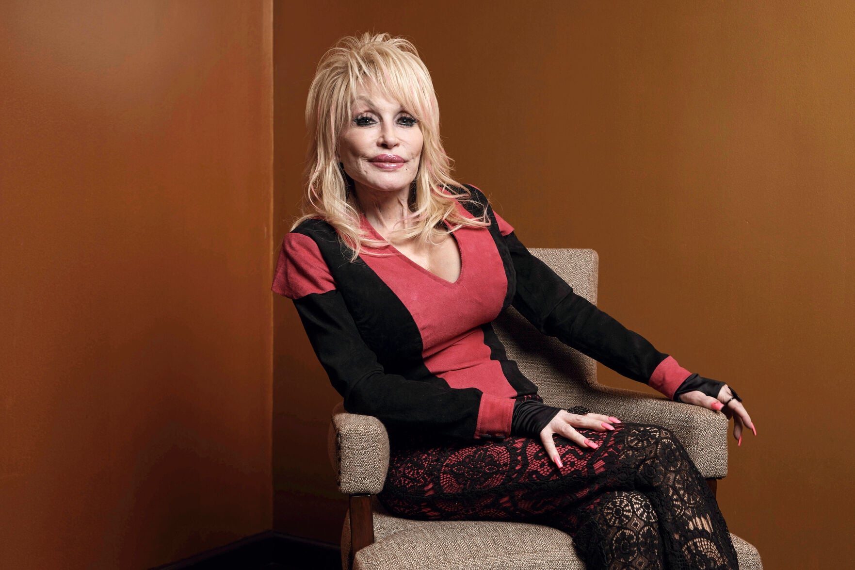 Dolly Parton, music star, actor and beloved figure who spanned