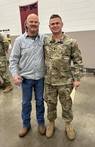 National Guard Specialist Brandon Moore and father (1).JPG