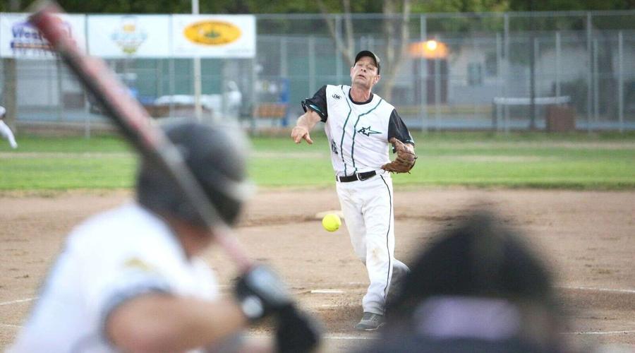 Power of positivity: Family, friends, softball community mourn loss of Mike Milligan, who died Sunday