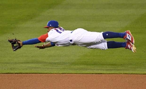 United States' Ian Kinsler hits a double during the eighth inning of a  semifinal in the World Baseball Classic against Japan, in Los Angeles,  Tuesday, March 21, 2017. (AP Photo/Chris Carlson)