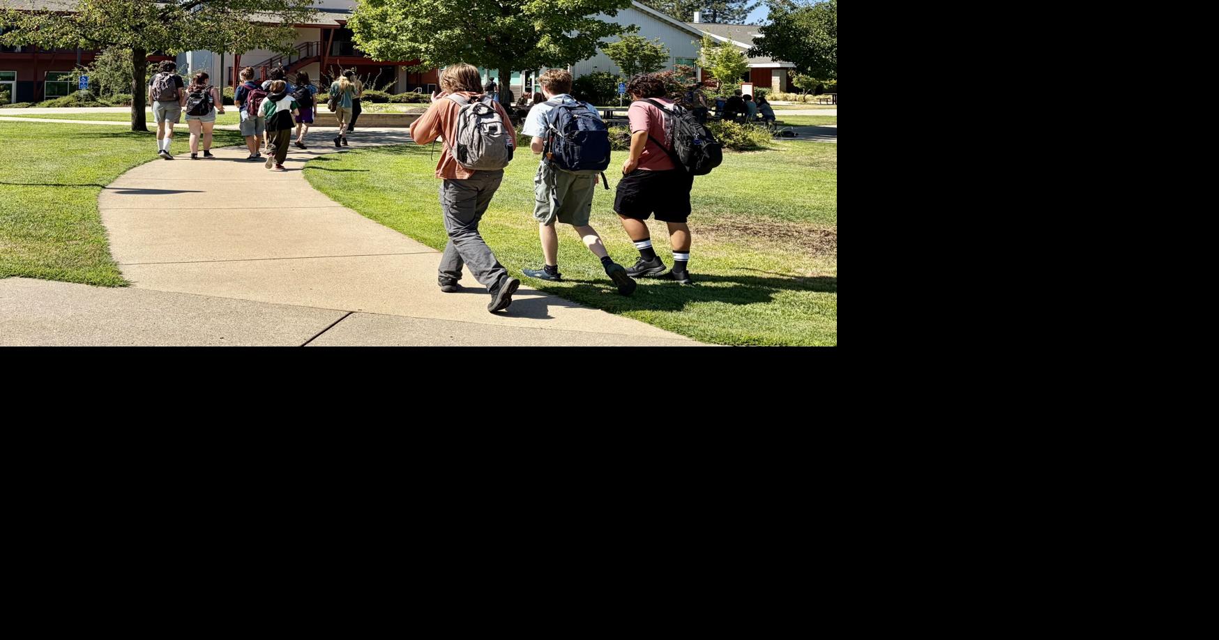Local high school students wave goodbye to summer break and head back to class