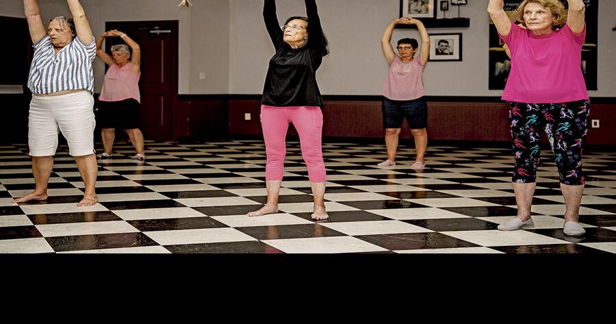Standing yoga helps residents unwind body and mind