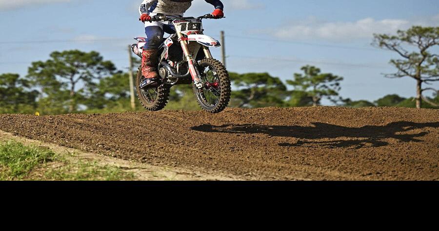 Former QB swaps field for track