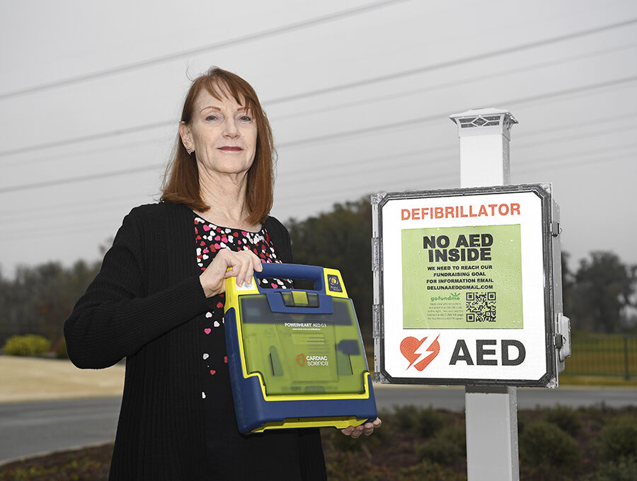 Village of DeLuna raises funds for Neighbors Saving Neighbors AED