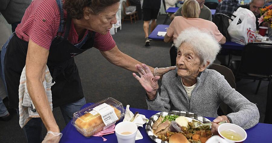 Volunteers serve heaps of smiles on Thanksgiving