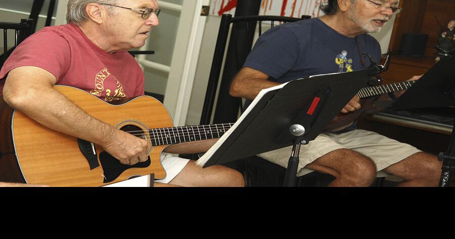 Villages folk group giving a &lsquo;Hoot&rsquo; and audience kazoos