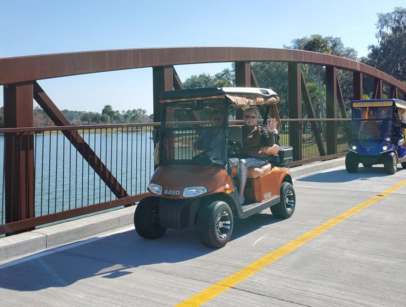 Club enjoys socially distant golf cart trip