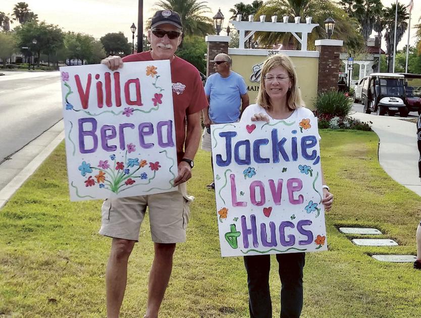 Residents surprise ill neighbor with messages of love, support
