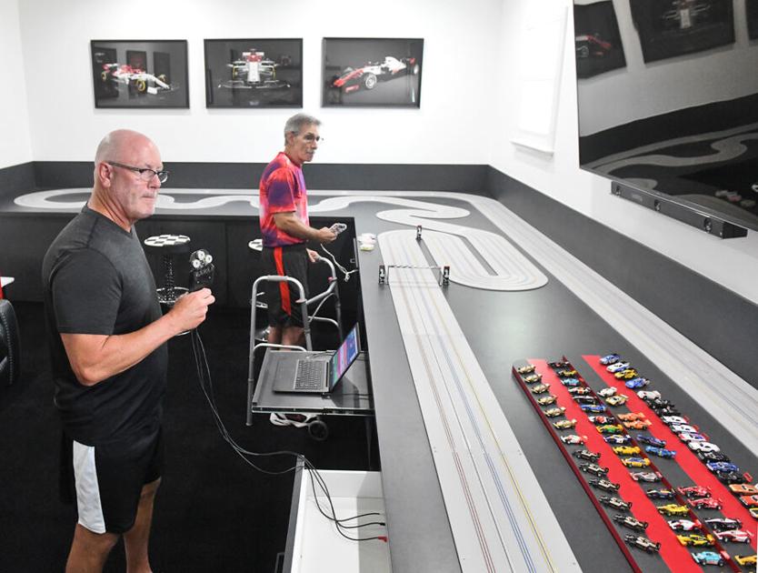Villages resident builds dream slot car track