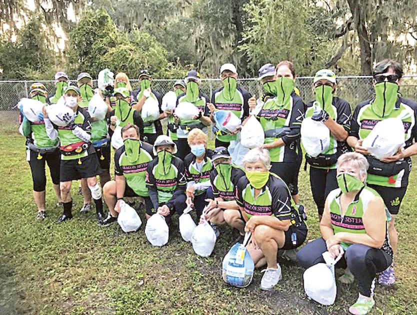 Dragon Sisters donate turkeys to Haven of Lake & Sumter