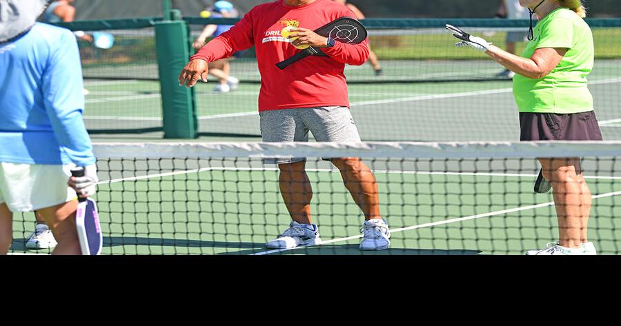 Pickleball referee shares the game with others