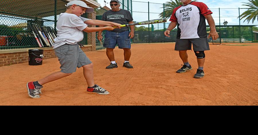 Hard-of-hearing kids take swing at camp