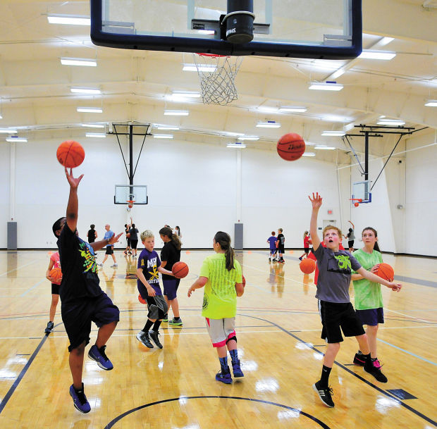 Students work on hoop skills and drills Local Sports
