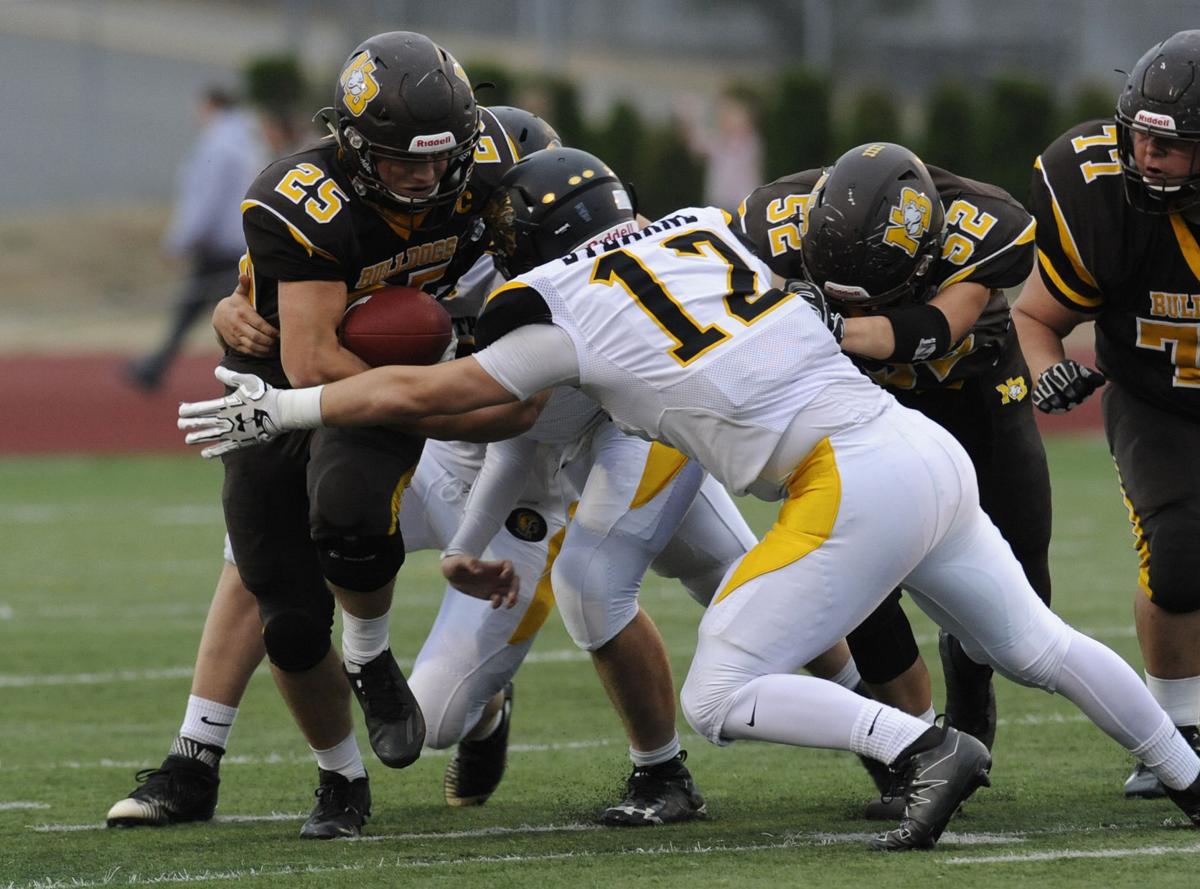 North Bend defeats Philomath, 54-7