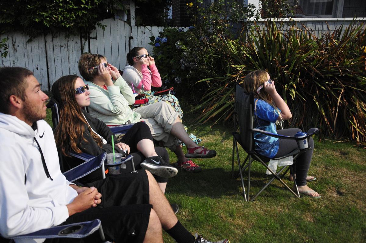 Locals watch eclipse