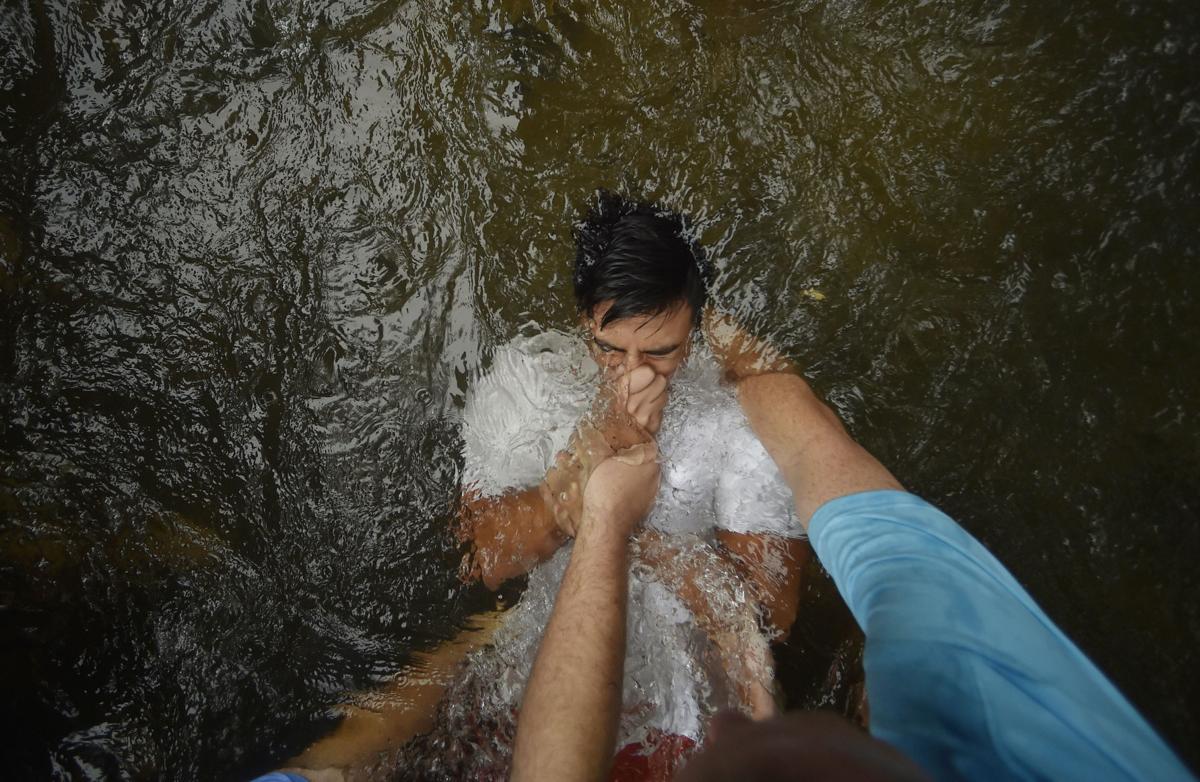 A river baptism, in 18 photos News