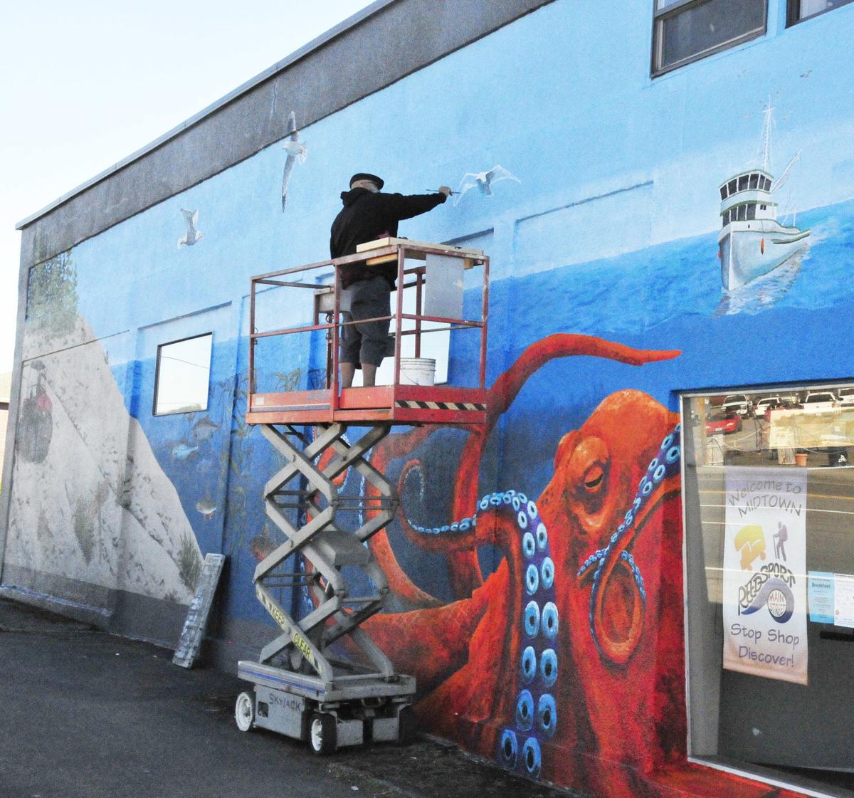 Muralist behind centennial mural completes another wall in Reedsport