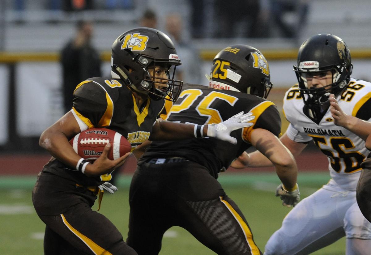 North Bend defeats Philomath, 54-7