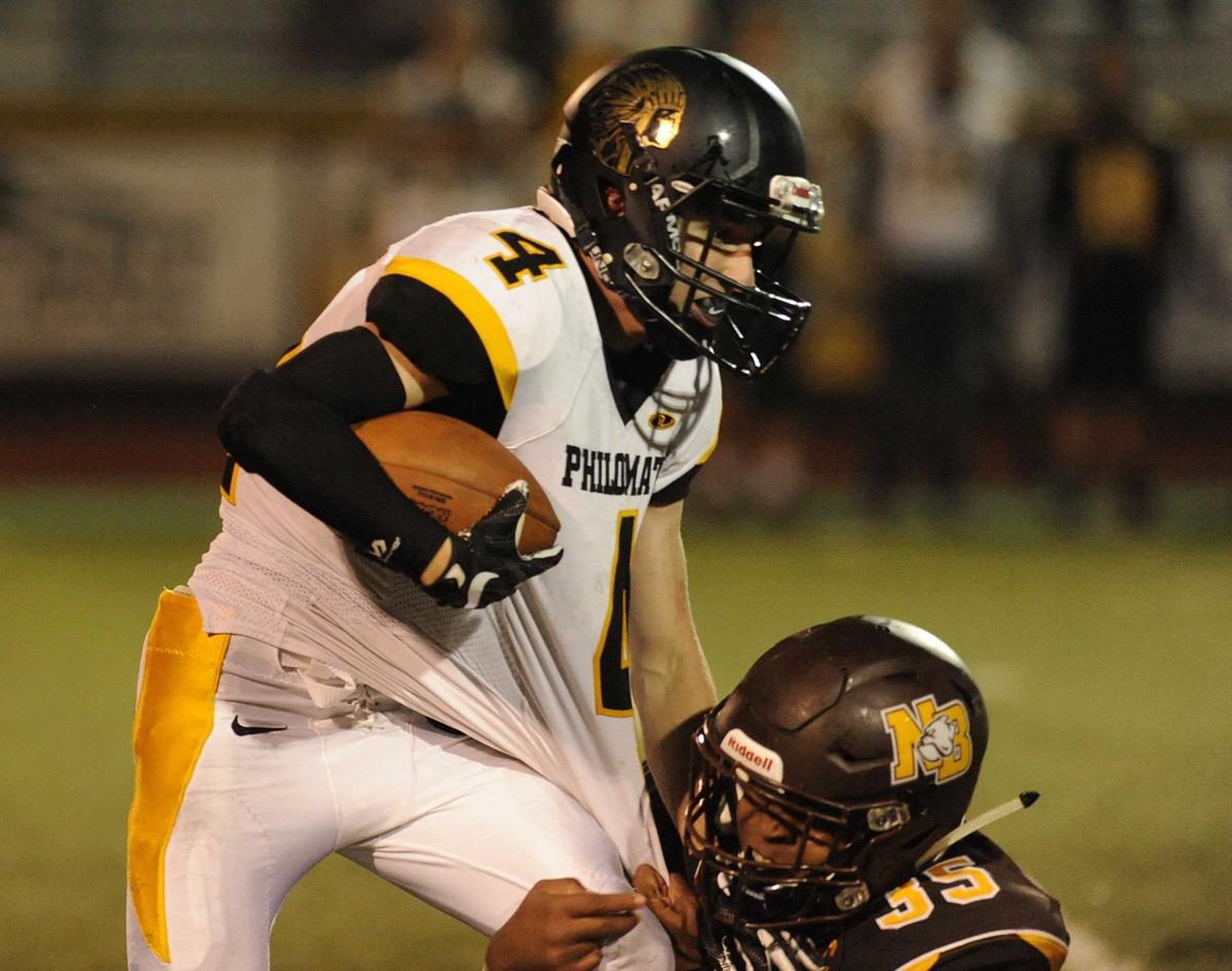 North Bend defeats Philomath, 54-7