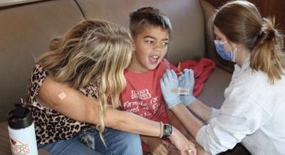 Flu-shot clinic honors the memory of Blake Crane