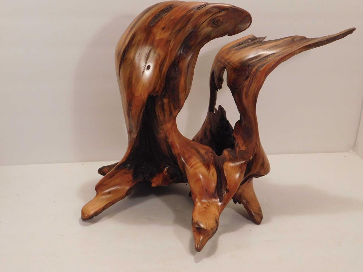 Minimalist photos, wood sculptures on display at library gallery