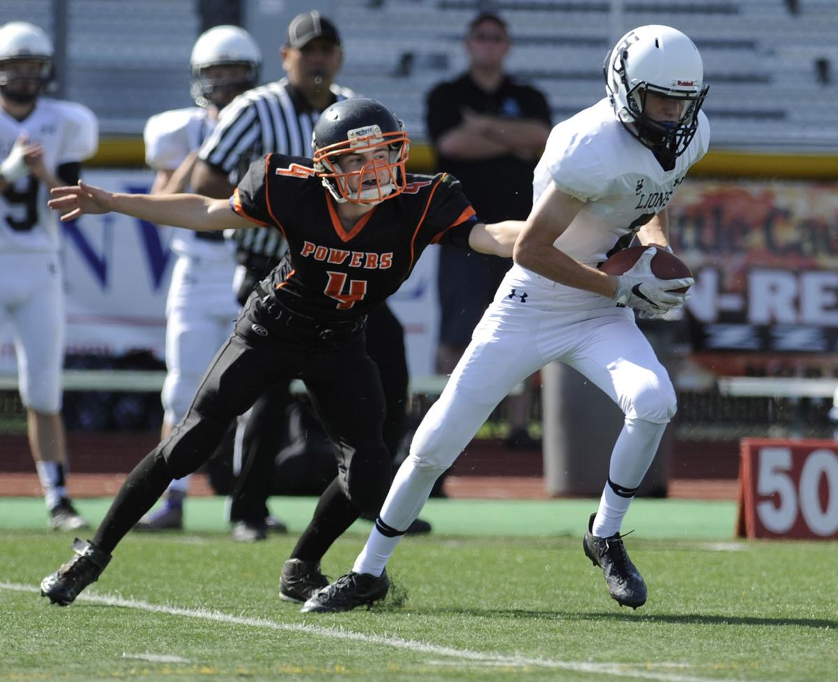 The Cruisers fall to the Lions, 52-26