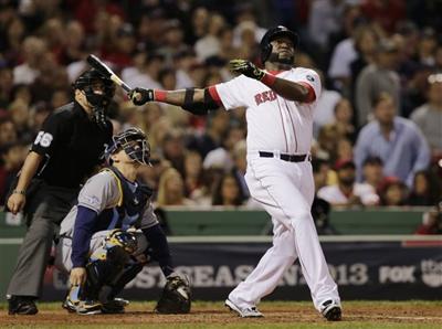Boston Red Sox designated hitter DAVID ORTIZ(BIG PAPI) singles