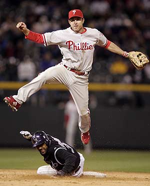 Utley leads Phils' wild chase