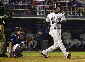 Barry Bonds of the San Francisco Giants watches his 73rd home run