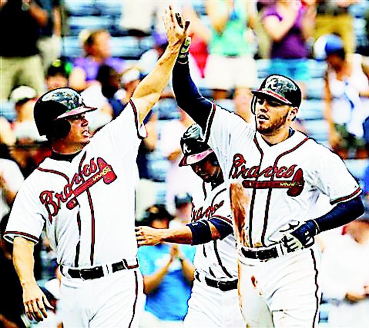 Freeman, Heyward power Braves past Rockies, 6-3